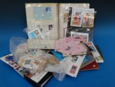 A box of loose stamps, albums, stock cards,