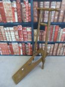 An ash folding boot jack (110cm tall)