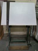 A WW2 era Lancaster draughtsman table with tilting mechanism,
