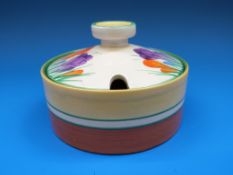 A Clarice Cliff squat lidded preserve pot,