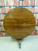 A Regency rosewood tilt top breakfast table with brass inlay to top and frieze continuing onto the