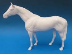 A large Beswick racehorse in rare matt white colourway