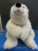 A very large Steiff polar bear with button to ear and original label to body (height 117cm)