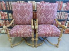 A pair of William and Mary style armchairs with Claremont Fortune upholstery.