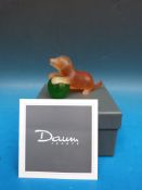 Daum glass puppy on green glass ball signed to the base Daum France (9cm long in original box with