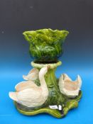 An unusual large Bretby figural swan jardiniere centrepiece (39cm high,