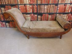 A 19th century mahogany chaise longue with scrolling sleigh ends
