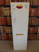 A white painted gun safe with keys