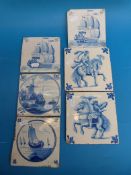 A collection of 18thC / 19thC Delft tiles decorated with ships and men on horseback etc