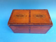 A Georgian mahogany inlaid and cross banded two dominion tea caddy