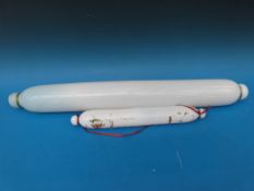 A large glass rolling pin and a smaller example