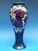 A large Moorcroft vase in the Finches pattern, 27.