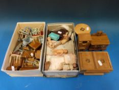 A collection of handmade wooden and metal dolls house furniture