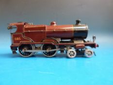 A Hornby 0 gauge 0-4-0 LMS No 2 clockwork Special locomotive 1185 and tender