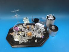 A large collection of Swarovski and other crystal figures.