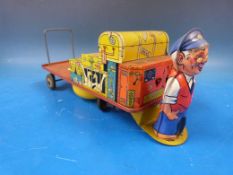 A Wells tinplate clockwork British Rail baggage trolley
