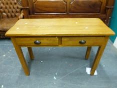 An oak sidetable or desk fitted two drawers (W110, D43,