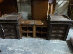 A oak desk unit with Wellington chest cabinet with lift up centre section opening to reveal pigeon