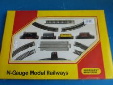 A Hornby N gauge minitrix train set together with a Tri-ang Hornby 00 gauge train set 