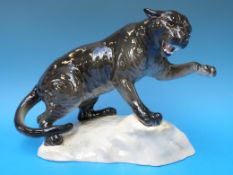 A Beswick large black puma on rock