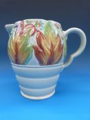 A Clarice Cliff Newport pottery relief moulded jug