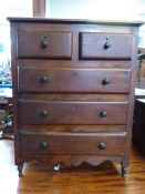 A 19thC miniature/apprentice chest of two over three drawers together with a leather jewellery box