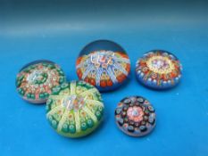 Five glass paperweights with millefiori and latticino decoration,