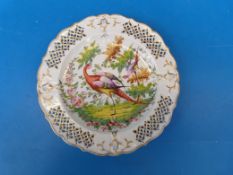 A c1810 hard paste cabinet plate with pierced rim and exotic bird decoration