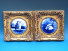 A pair of Royal Doulton style blue children plaques