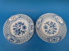 A pair of pierced Meissen plates