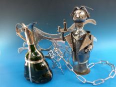 Four wine related items including stainless steel wine rack,
