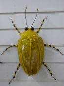 A signed Adrian Holt large yellow and black ceramic exotic insect (60cm)