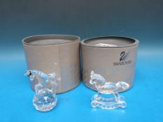 Two Swarovski crystal horses,