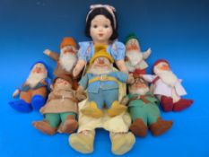 A set of Chad Valley Hygienic Textile Toys Snow White and the Seven Dwarfs.