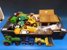 A collection of Britains farm vehicles,  tractors, horse boxes,