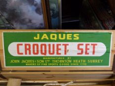 A vintage croquet set in original wooden box.
