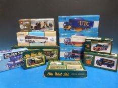 Twelve Corgi diecast model vehicles including Eddie Stobart,