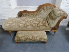 A chaise longue together with a matching stool