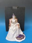 A boxed limited edition Royal Worcester model of Queen Elizabeth in Coronation robes (172/500 with