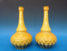 A pair of George Jones vases with sunflower decoration