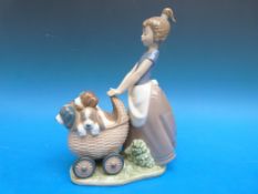 Lladro figure of a girl with pram and a litter of puppies (22cm tall)