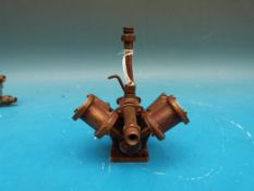 A Stuart Turner V twin cylinder marine engine with oscillating cylinders and regulator