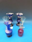 A pair of hand-painted Bristol Blue glasses together with a pair of figural cordial glasses,