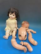 A British National Dolls (B.N.D) doll marked to the back of the neck BND London (height 42.