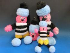 A boxed set of five Beijing Olympics 2002 toy figurines together with a London 2012 example and a