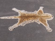 Two wool rugs in the form of animals