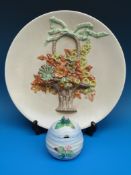A Clarice Cliff relief moulded plaque and honeypot (plaque 34cm diameter)