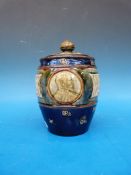 A Doulton Lambeth tobacco jar with initials AR and ER and portraits of the king and queen with