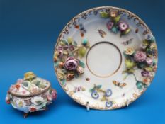 A 19thC Meissen lidded pot on saucer with applied flower decoration