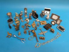 A quantity of small brass and metal items etc including bosun's whistle, match cases,
